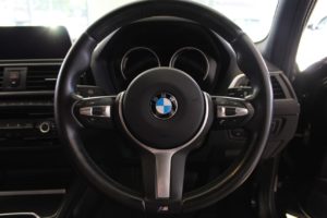 Used_2017_BLACK_BMW_1-SERIES_1