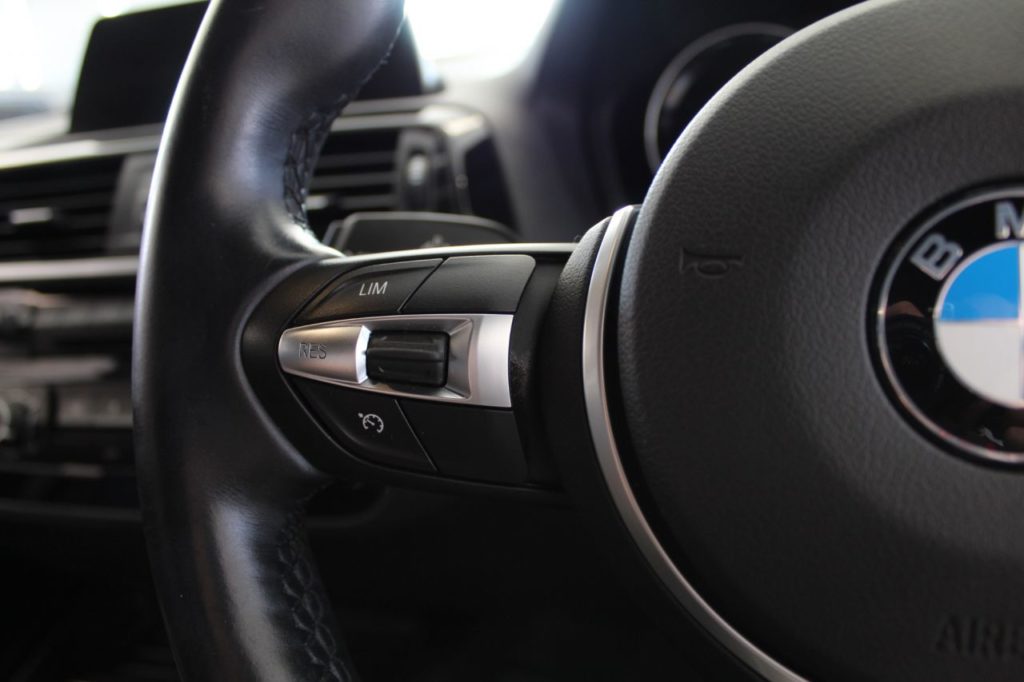 Used_2017_BLACK_BMW_1-SERIES_1
