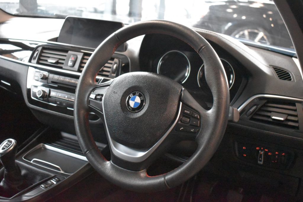 Used_2018_BLUE_BMW_1-SERIES_1