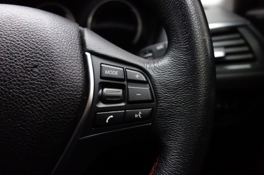Used_2017_BLACK_BMW_1-SERIES_1