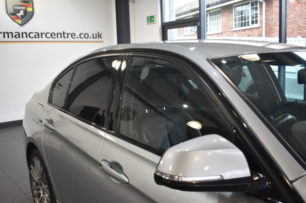 Used_2016_SILVER_BMW_3-SERIES_2