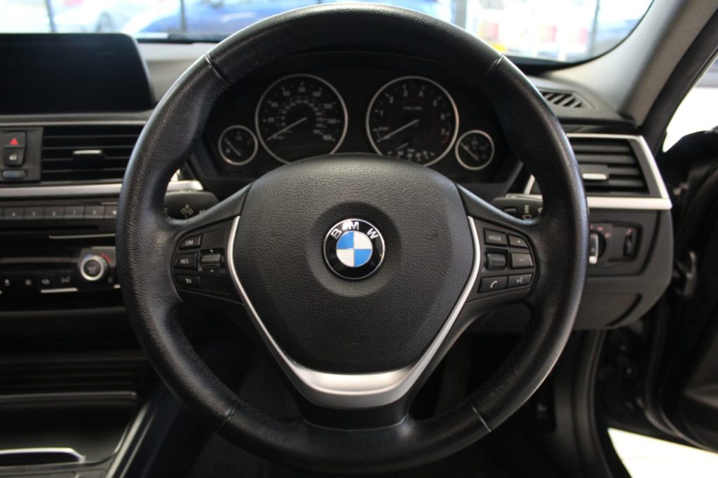 Used_2015_BLACK_BMW_3-SERIES_2