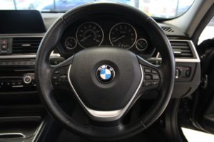 Used_2015_BLACK_BMW_3-SERIES_2