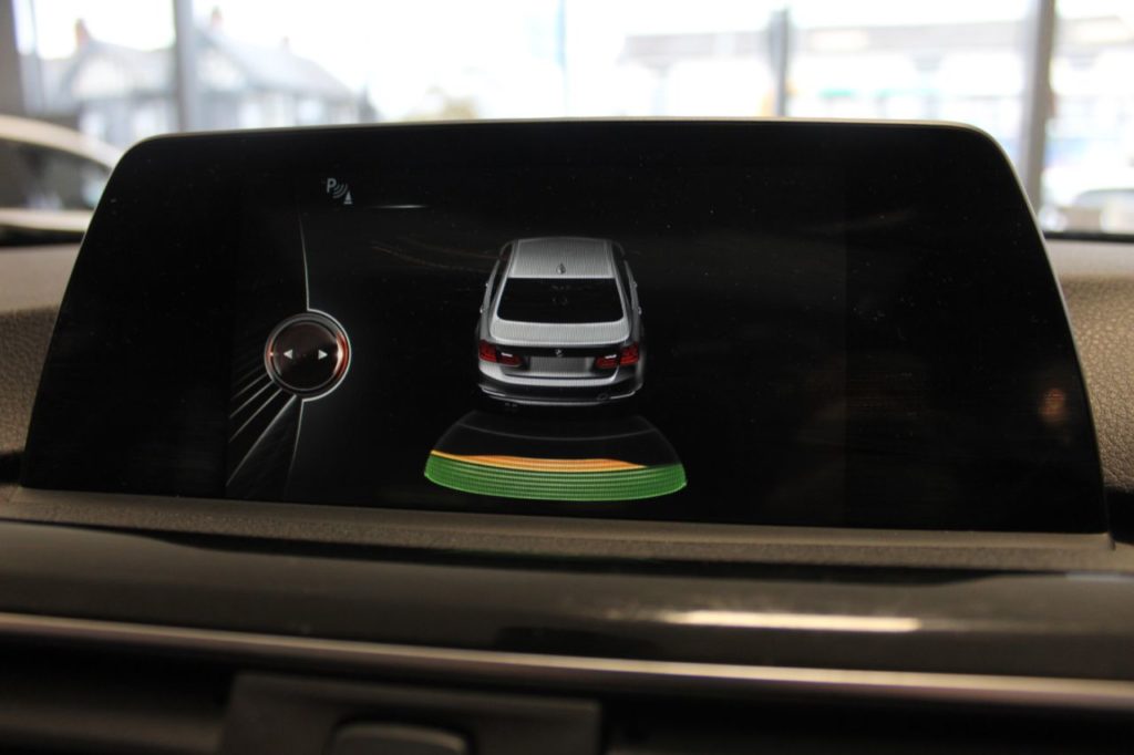 Used_2015_BLACK_BMW_3-SERIES_2
