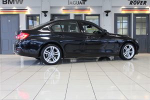 Used_2015_BLACK_BMW_3-SERIES_2