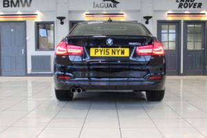 Used_2015_BLACK_BMW_3-SERIES_2