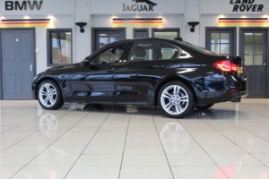 Used_2015_BLACK_BMW_3-SERIES_2