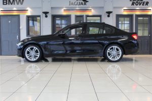 Used_2015_BLACK_BMW_3-SERIES_2