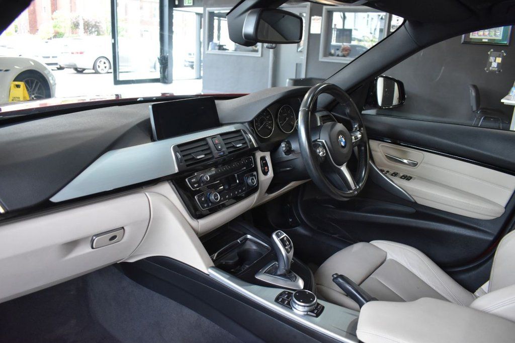 Used_2015_RED_BMW_3-SERIES_2