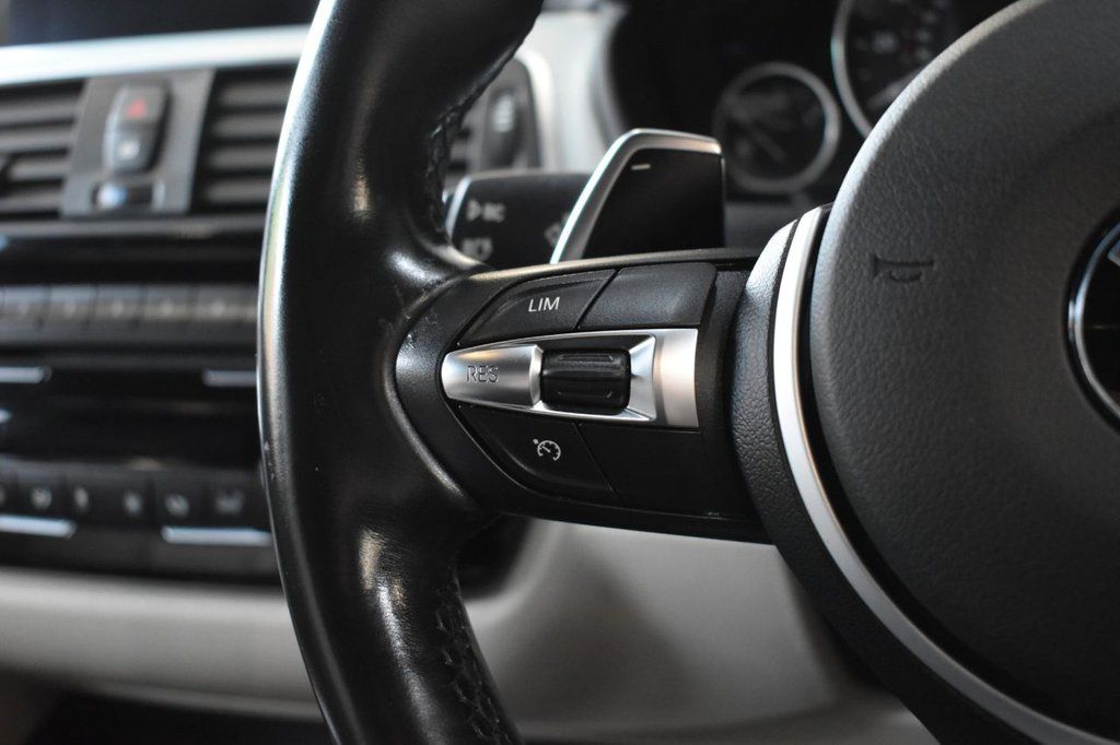 Used_2015_RED_BMW_3-SERIES_2