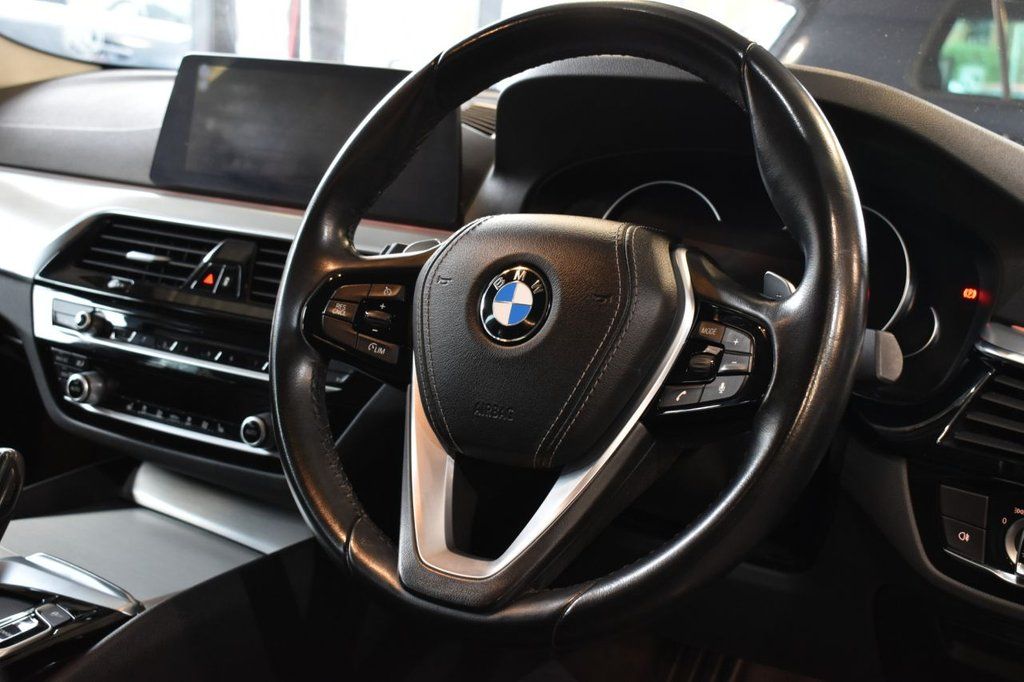 Used_2018_BLACK_BMW_5-SERIES_2